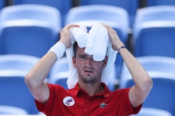 欧冠app下载-日媒：奥组委应对高温太迟缓 桃田贤斗失利很意外